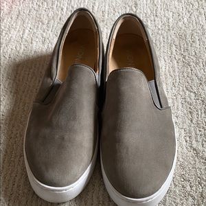 Gray suede sneakers with arch supports